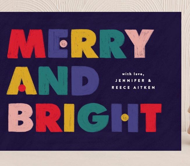 Brightly colored holiday card that says "Merry and Bright"